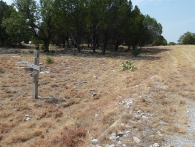Nice corner lot on a cul-de-sac has distant lake views from the on Summit Rock Golf Course in Texas - for sale on GolfHomes.com, golf home, golf lot
