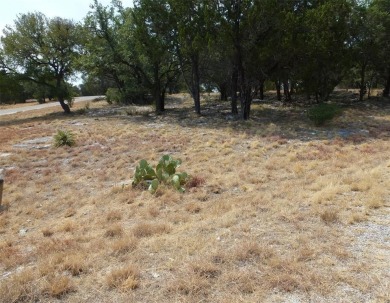 Nice corner lot on a cul-de-sac has distant lake views from the on Summit Rock Golf Course in Texas - for sale on GolfHomes.com, golf home, golf lot