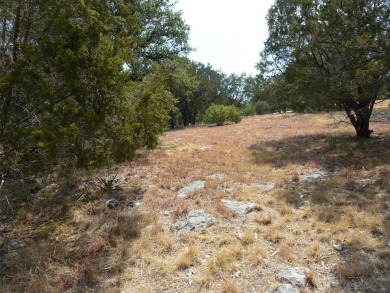 Nice corner lot on a cul-de-sac has distant lake views from the on Summit Rock Golf Course in Texas - for sale on GolfHomes.com, golf home, golf lot