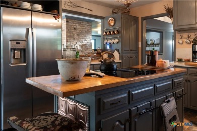 Distinctive brick traditional home backing up to fairway of Mill on Mill Creek Golf Club in Texas - for sale on GolfHomes.com, golf home, golf lot
