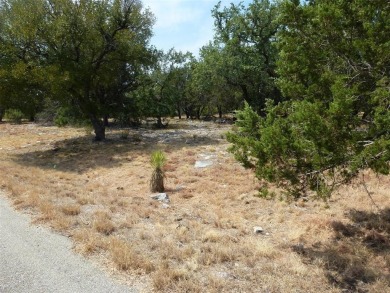 Nice corner lot on a cul-de-sac has distant lake views from the on Summit Rock Golf Course in Texas - for sale on GolfHomes.com, golf home, golf lot