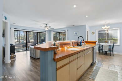 The perfect blend of relaxation and opportunity, this charming on Oyster Bay Golf Links in North Carolina - for sale on GolfHomes.com, golf home, golf lot