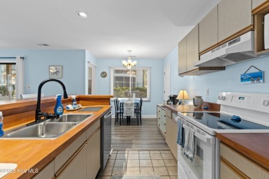 The perfect blend of relaxation and opportunity, this charming on Oyster Bay Golf Links in North Carolina - for sale on GolfHomes.com, golf home, golf lot