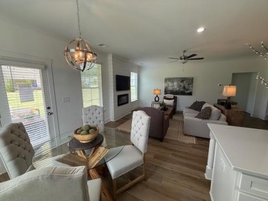 MODEL HOME!  Now on the market in the Enclave at Heron Ridge. As on Harbor Club Golf and Country Club in Georgia - for sale on GolfHomes.com, golf home, golf lot
