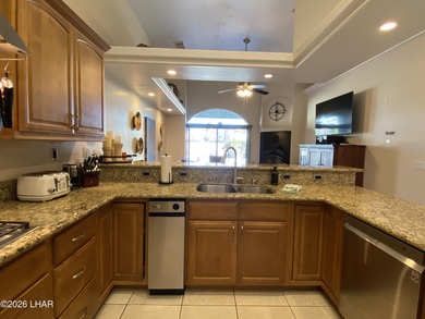 2713 Plaza Verde is a home beyond ordinary! Premier Residential on London Bridge Golf Course in Arizona - for sale on GolfHomes.com, golf home, golf lot