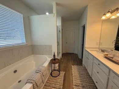 MODEL HOME!  Now on the market in the Enclave at Heron Ridge. As on Harbor Club Golf and Country Club in Georgia - for sale on GolfHomes.com, golf home, golf lot