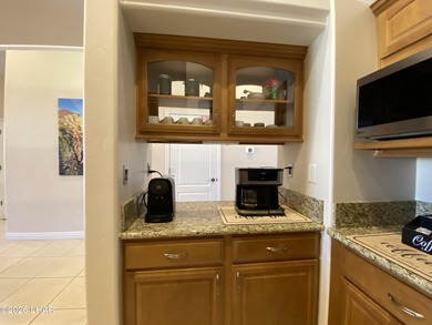 2713 Plaza Verde is a home beyond ordinary! Premier Residential on London Bridge Golf Course in Arizona - for sale on GolfHomes.com, golf home, golf lot