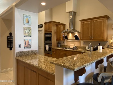 2713 Plaza Verde is a home beyond ordinary! Premier Residential on London Bridge Golf Course in Arizona - for sale on GolfHomes.com, golf home, golf lot