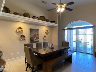 2713 Plaza Verde is a home beyond ordinary! Premier Residential on London Bridge Golf Course in Arizona - for sale on GolfHomes.com, golf home, golf lot