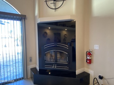 2713 Plaza Verde is a home beyond ordinary! Premier Residential on London Bridge Golf Course in Arizona - for sale on GolfHomes.com, golf home, golf lot