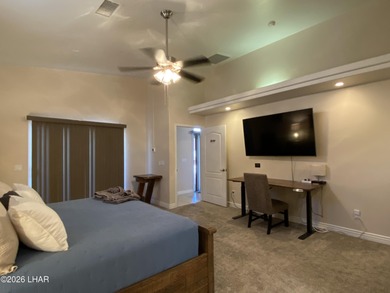 2713 Plaza Verde is a home beyond ordinary! Premier Residential on London Bridge Golf Course in Arizona - for sale on GolfHomes.com, golf home, golf lot