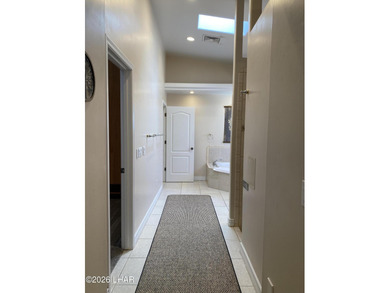 2713 Plaza Verde is a home beyond ordinary! Premier Residential on London Bridge Golf Course in Arizona - for sale on GolfHomes.com, golf home, golf lot