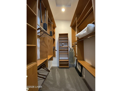 2713 Plaza Verde is a home beyond ordinary! Premier Residential on London Bridge Golf Course in Arizona - for sale on GolfHomes.com, golf home, golf lot