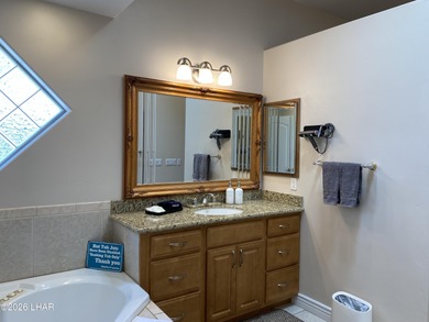 2713 Plaza Verde is a home beyond ordinary! Premier Residential on London Bridge Golf Course in Arizona - for sale on GolfHomes.com, golf home, golf lot