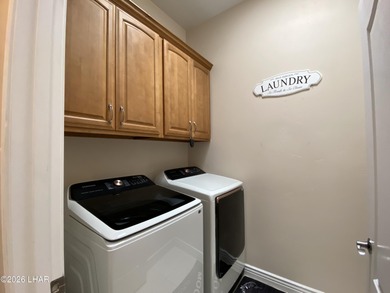 2713 Plaza Verde is a home beyond ordinary! Premier Residential on London Bridge Golf Course in Arizona - for sale on GolfHomes.com, golf home, golf lot