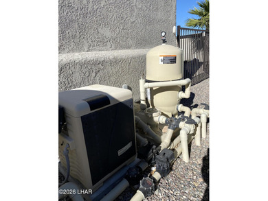 2713 Plaza Verde is a home beyond ordinary! Premier Residential on London Bridge Golf Course in Arizona - for sale on GolfHomes.com, golf home, golf lot