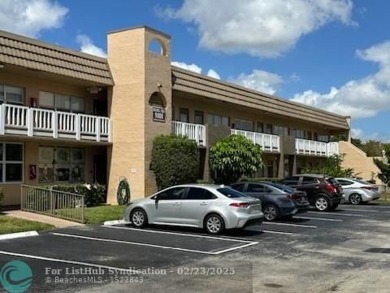 WELCOME TO THIIS CHARMING FIRST FLOOR CONDO, PERFECTLY SITUATED on Sunrise Lakes Phase III in Florida - for sale on GolfHomes.com, golf home, golf lot