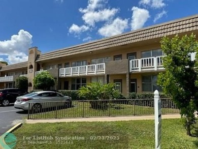 WELCOME TO THIIS CHARMING FIRST FLOOR CONDO, PERFECTLY SITUATED on Sunrise Lakes Phase III in Florida - for sale on GolfHomes.com, golf home, golf lot