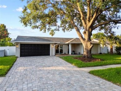 Experience waterfront luxury living in this fully renovated on Bloomingdale Golfers Club in Florida - for sale on GolfHomes.com, golf home, golf lot