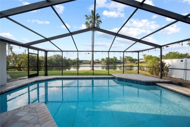 Experience waterfront luxury living in this fully renovated on Bloomingdale Golfers Club in Florida - for sale on GolfHomes.com, golf home, golf lot