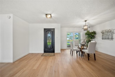 Experience waterfront luxury living in this fully renovated on Bloomingdale Golfers Club in Florida - for sale on GolfHomes.com, golf home, golf lot