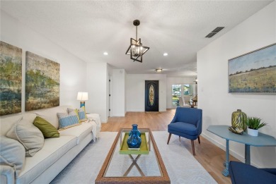 Experience waterfront luxury living in this fully renovated on Bloomingdale Golfers Club in Florida - for sale on GolfHomes.com, golf home, golf lot