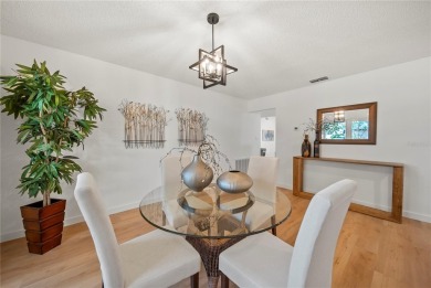 Experience waterfront luxury living in this fully renovated on Bloomingdale Golfers Club in Florida - for sale on GolfHomes.com, golf home, golf lot