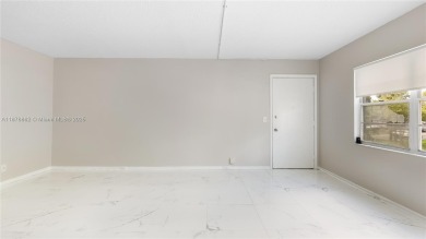 Beautifully upgraded 2BR/2BA corner unit in Century Village, a on Flamingo Lakes Country Club in Florida - for sale on GolfHomes.com, golf home, golf lot