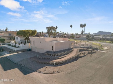 Prestigiously located just before the first tee of the golf on London Bridge Golf Course in Arizona - for sale on GolfHomes.com, golf home, golf lot