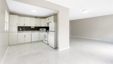 Beautifully upgraded 2BR/2BA corner unit in Century Village, a on Flamingo Lakes Country Club in Florida - for sale on GolfHomes.com, golf home, golf lot