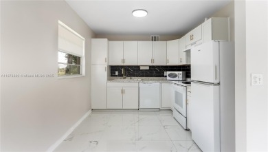 Beautifully upgraded 2BR/2BA corner unit in Century Village, a on Flamingo Lakes Country Club in Florida - for sale on GolfHomes.com, golf home, golf lot