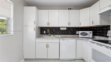 Beautifully upgraded 2BR/2BA corner unit in Century Village, a on Flamingo Lakes Country Club in Florida - for sale on GolfHomes.com, golf home, golf lot