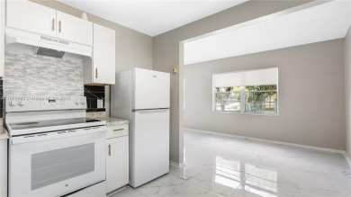 Beautifully upgraded 2BR/2BA corner unit in Century Village, a on Flamingo Lakes Country Club in Florida - for sale on GolfHomes.com, golf home, golf lot