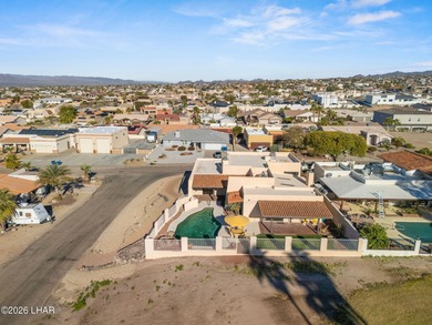 Prestigiously located just before the first tee of the golf on London Bridge Golf Course in Arizona - for sale on GolfHomes.com, golf home, golf lot