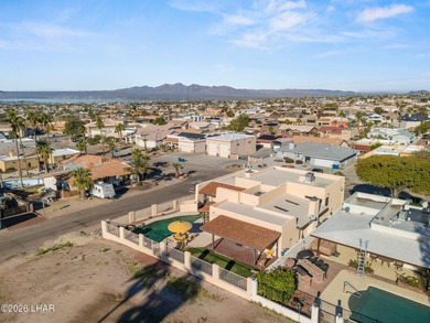 Prestigiously located just before the first tee of the golf on London Bridge Golf Course in Arizona - for sale on GolfHomes.com, golf home, golf lot