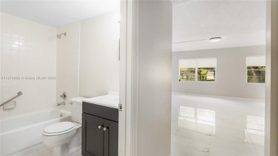 Beautifully upgraded 2BR/2BA corner unit in Century Village, a on Flamingo Lakes Country Club in Florida - for sale on GolfHomes.com, golf home, golf lot