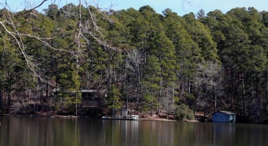 Lake Front Home Located on 120 acre private spring fed Lake in on Pine Dunes Golf Course in Texas - for sale on GolfHomes.com, golf home, golf lot