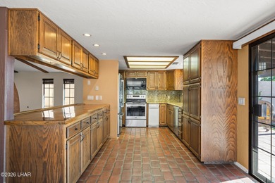 Prestigiously located just before the first tee of the golf on London Bridge Golf Course in Arizona - for sale on GolfHomes.com, golf home, golf lot