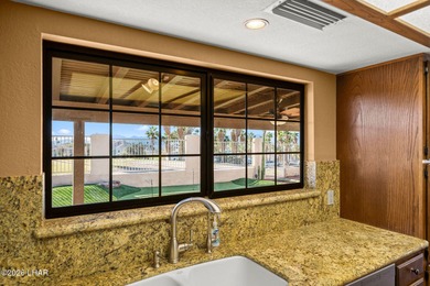 Prestigiously located just before the first tee of the golf on London Bridge Golf Course in Arizona - for sale on GolfHomes.com, golf home, golf lot