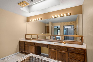 Prestigiously located just before the first tee of the golf on London Bridge Golf Course in Arizona - for sale on GolfHomes.com, golf home, golf lot