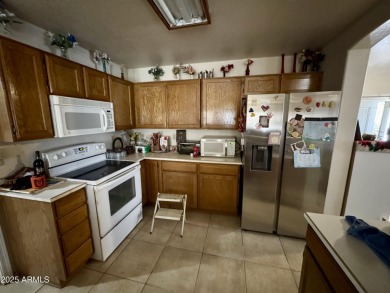 You are going to really like the potential of this Glendale on Desert Mirage Golf Course in Arizona - for sale on GolfHomes.com, golf home, golf lot