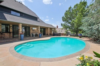 Come see the amazing home located on the west side of Oak Tree on Oak Tree National Golf and Country Club in Oklahoma - for sale on GolfHomes.com, golf home, golf lot