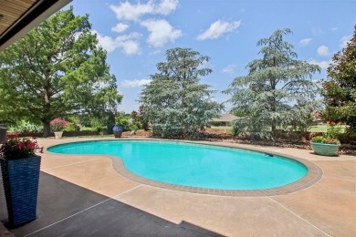 Come see the amazing home located on the west side of Oak Tree on Oak Tree National Golf and Country Club in Oklahoma - for sale on GolfHomes.com, golf home, golf lot