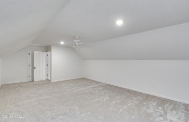 Welcome to this elegant 6-bedroom, 4.5-bathroom home with a on Colonial Country Club Deerfield in Mississippi - for sale on GolfHomes.com, golf home, golf lot