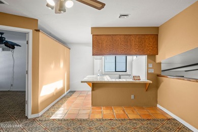 Prestigiously located just before the first tee of the golf on London Bridge Golf Course in Arizona - for sale on GolfHomes.com, golf home, golf lot