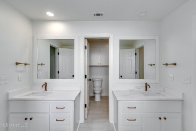 Welcome to this elegant 6-bedroom, 4.5-bathroom home with a on Colonial Country Club Deerfield in Mississippi - for sale on GolfHomes.com, golf home, golf lot