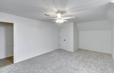 Welcome to this elegant 6-bedroom, 4.5-bathroom home with a on Colonial Country Club Deerfield in Mississippi - for sale on GolfHomes.com, golf home, golf lot