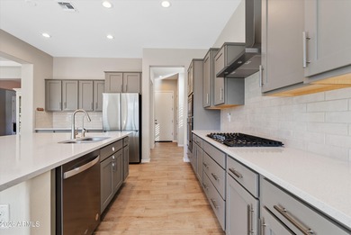 Welcome to this highly upgraded, meticulously maintained home in on Poston Butte Golf Club in Arizona - for sale on GolfHomes.com, golf home, golf lot