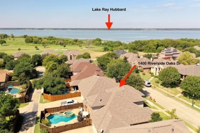 Stunning 5-bedroom, 3-bath home with a 3-car garage is located on The Shores Country Club in Texas - for sale on GolfHomes.com, golf home, golf lot