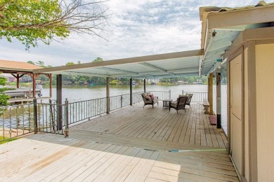 Welcome to your personal lakefront sanctuary in the prestigious on Hide-A-Way Lake Golf Course in Texas - for sale on GolfHomes.com, golf home, golf lot